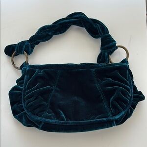 luxurious velvet handbag in deep green